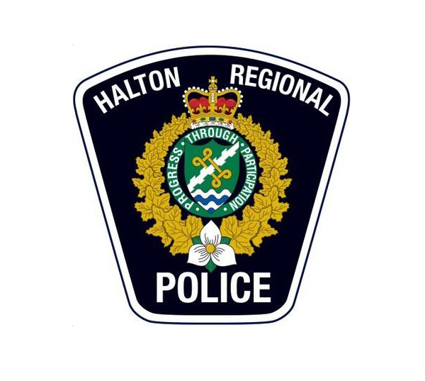 Halton police have issued a warrant in connection with a baseball bat attack.