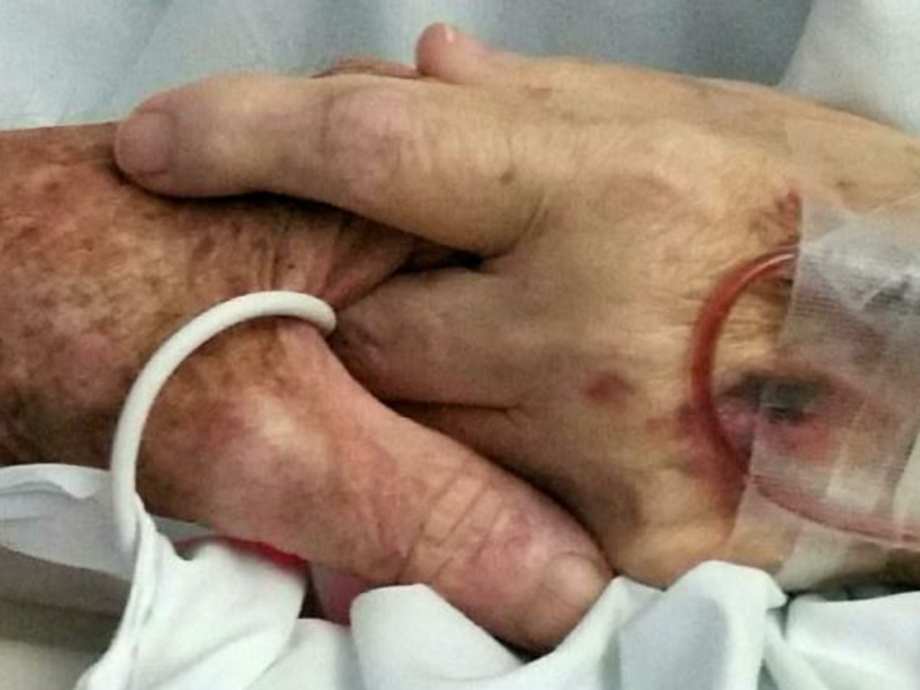 File photo of people holding hands.