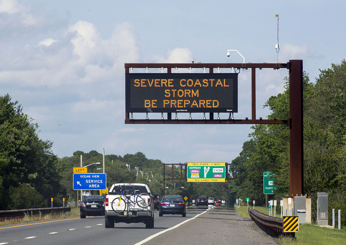 A sign along Garden State Parkway warns travelers about Tropical Storm Hermine on September 4, 2016 near Ocean City, New Jersey. Hermine made landfall as a Category 1 hurricane but has weakened back to a tropical storm.