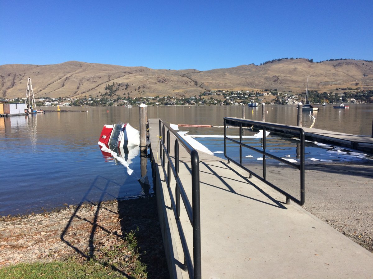 Paddle Wheel Park boat launch is closed as officials deal with a partially submerged boat.