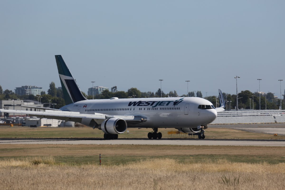 YVR Vancouver International Airport runway plane taking off westjet