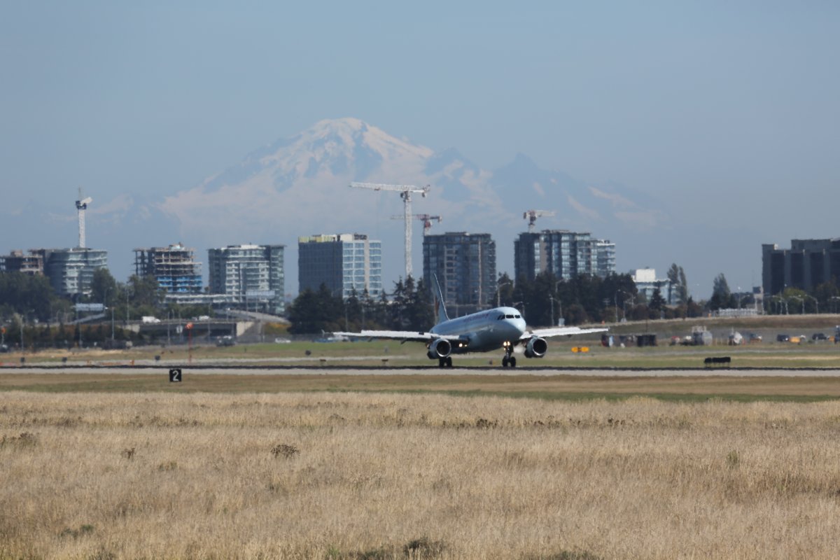 YVR Vancouver International Airport runway plane taking off