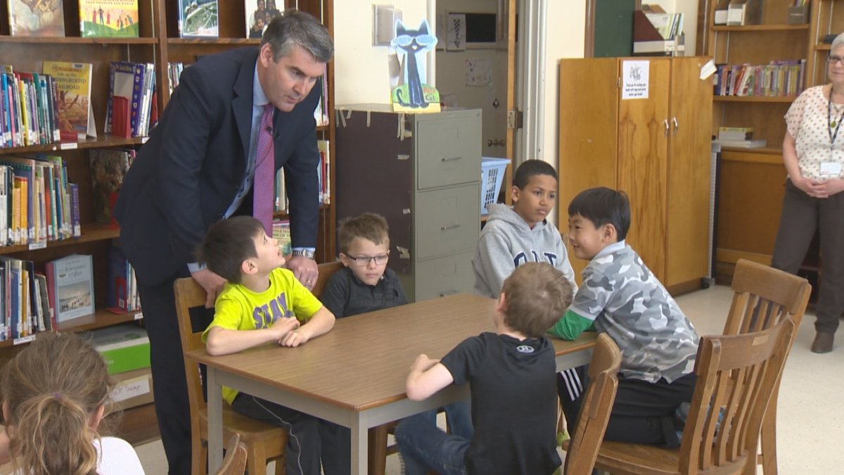 NS Premier Stephen McNeil is pictured talking to students at Inglis Street Elementary School in Halifax on April 20, 2016.