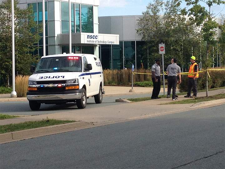 Security staff seen outside of the Nova Scotia Community College Institute of Technology campus on Wednesday, September 21, 2016.