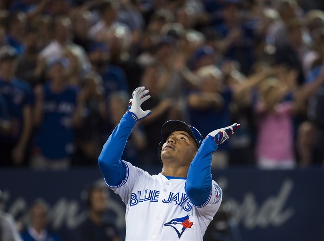 Toronto Blue Jays right fielder Ezequiel Carrera reacts after hitting a solo home run against the Tampa Bay Rays during eighth inning AL baseball action in Toronto on Monday, September 12, 2016. 