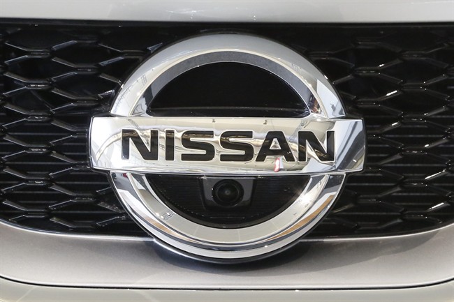 FILE - This Feb. 11, 2016, photo shows a Nissan emblem on a 2016 Nissan automobile at the Pittsburgh International Auto Show in Pittsburgh.
