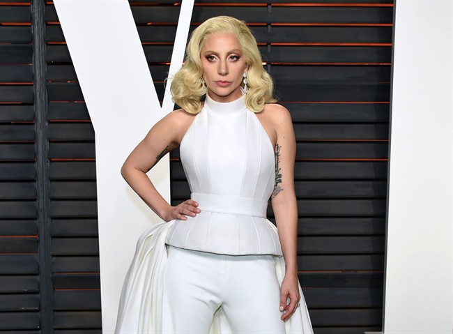 In this Feb. 28, 2016 file photo, Lady Gaga arrives at the Vanity Fair Oscar Party in Beverly Hills, Calif.
