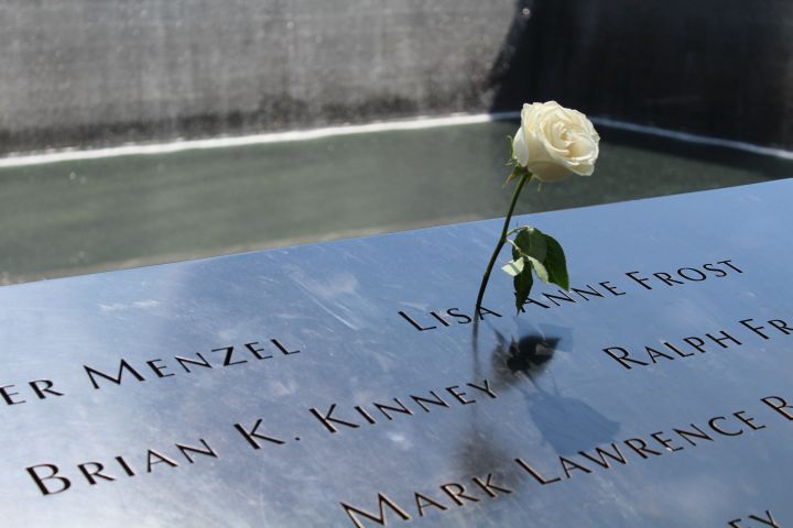 A rose placed on the names of 9/11 victims at the memorial.