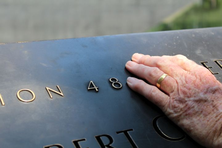 The hand of the woman I spoke to while visiting the 9/11 memorial summer 2016.