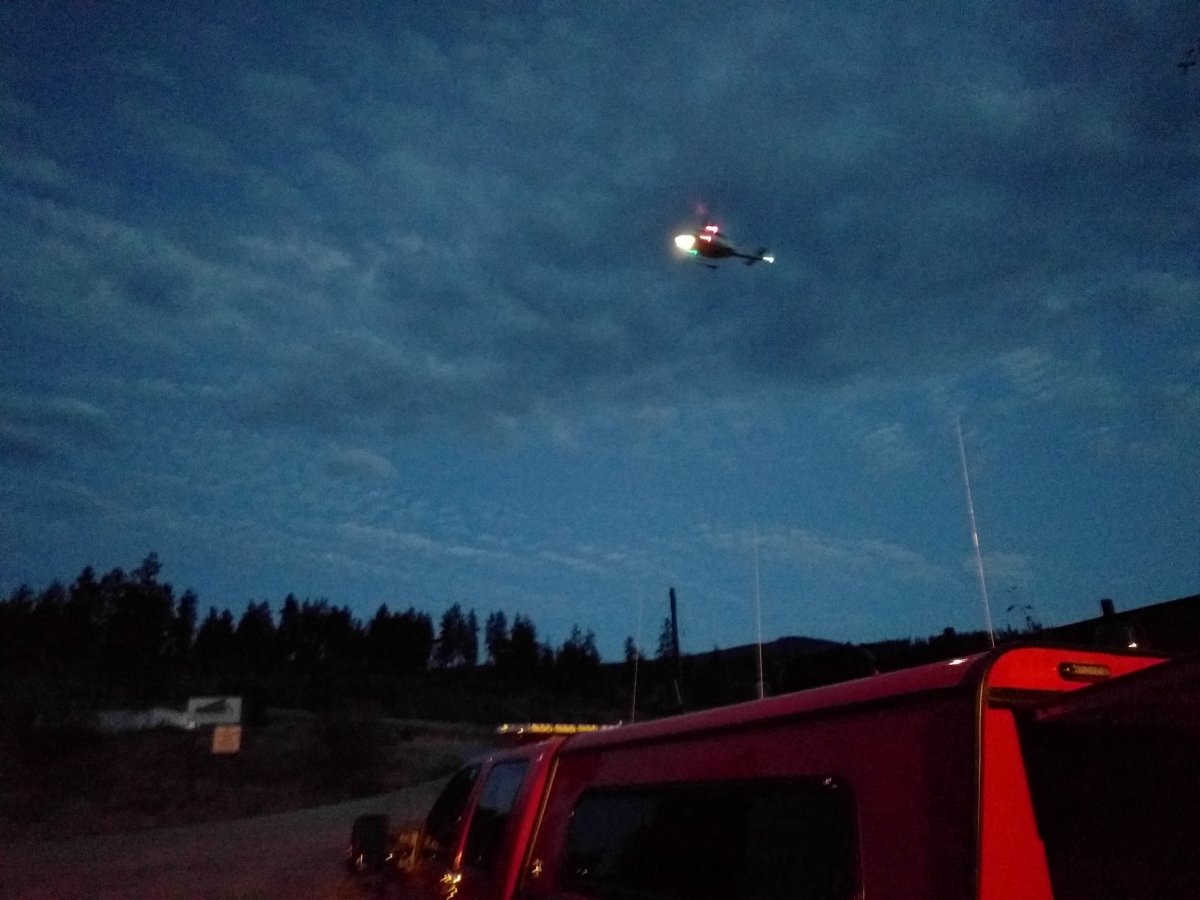 A B.C. Air Rescue team helicopter at the scene in Kelowna's Crawford area for what COSAR said was a 'dramatic rescue'. 