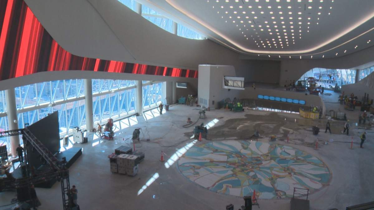 View from the reservation-only Curve restaurant at the Rogers Place arena in downtown Edmonton of the 14-metre diameter mosaic tile art piece on the floor of Ford Hall (formerly called the Winter Garden). The piece was created from artist Alex Janvier’s Tsa tsa ke k’e (Iron Foot Place) painting. Image taken September 7, 2016.