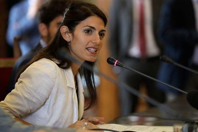 In this Thursday, Sept. 15, 2016 file photo, Rome's Mayor Virginia Raggi attends a press conference at Rome's Capitol Hill.