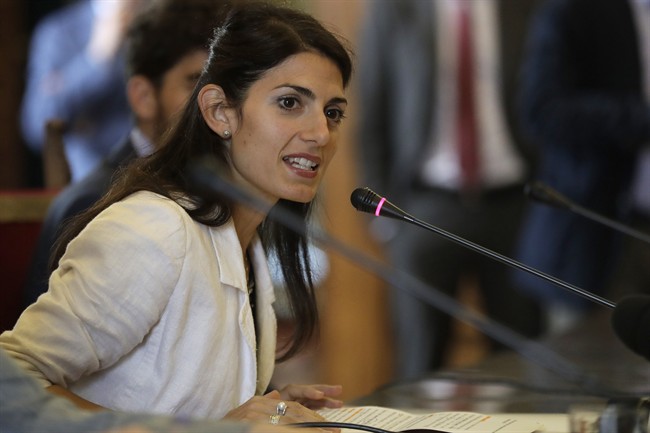 In this Thursday, Sept. 15, 2016 file photo, Rome's Mayor Virginia Raggi attends a press conference at Rome's Capitol Hill.