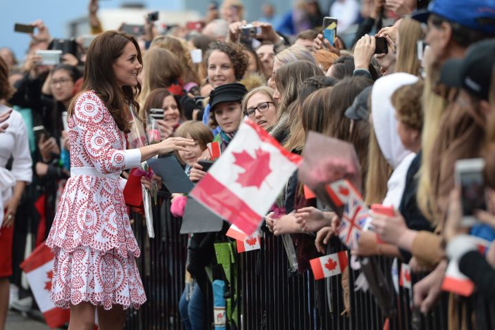 Britain’s Kate, the Duchess of Cambridge, greets well-wishers as she arrives at Jack Poole Plaza in Vancouver on Sunday, Sept. 25, 2016.