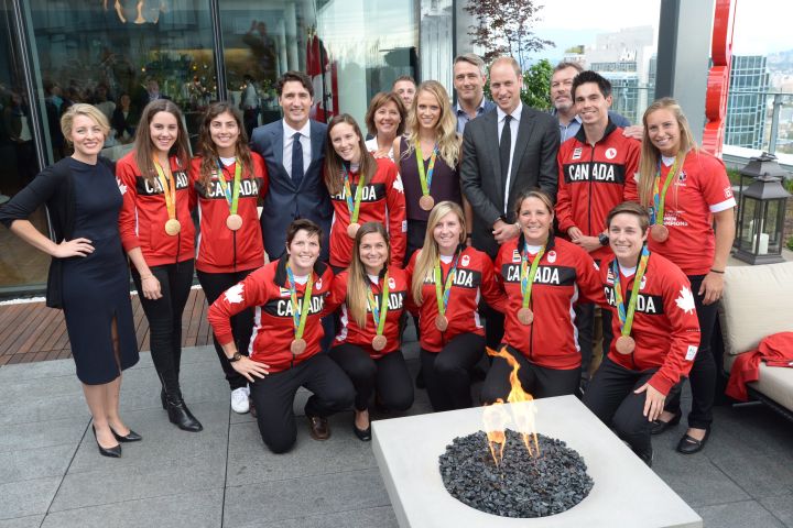 Prince William and Prime Minister Justin Trudeau pose with Canadian Olympic athletes in Vancouver, B.C., Sunday, Sept. 25, 2016.
