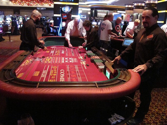 This June 24, 2016, photo shows a craps game underway at the Golden Nugget casino in Atlantic City, N.J. 