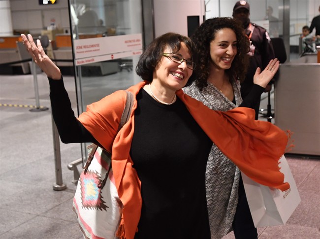 Iranian-Canadian professor Homa Hoodfar smiles as she arrives in Montreal on Thursday, Sept. 29, 2016. The anthropology professor spent nearly four months in prison in Iran.
