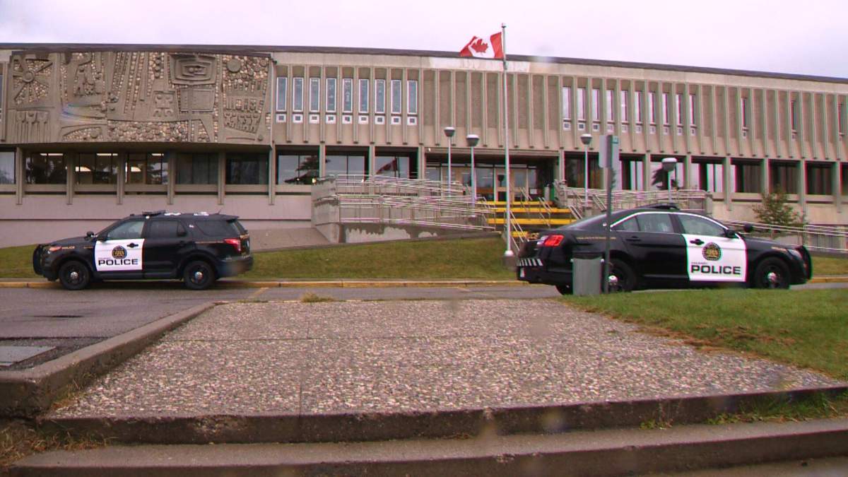 Calgary police respond to Bishop Grandin High School on Tuesday, Sept. 20, 2016 after a lockdown was initiated. 