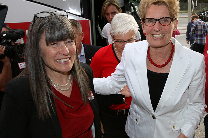 Ontario Premier Kathleen Wynne with Kingston and the Islands Liberal candidate Sophie Kiwala arriving at a campaign stop in Kingston, Ont., May 8, 2014. 
