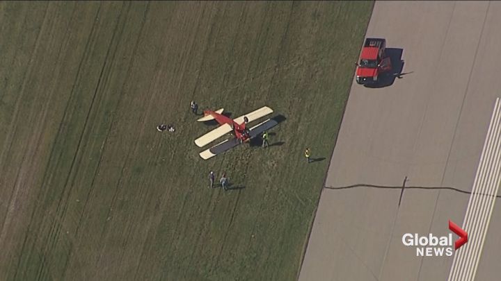 A plane flipped over after landing at the Springbank Airport Sept. 13, 2016.
