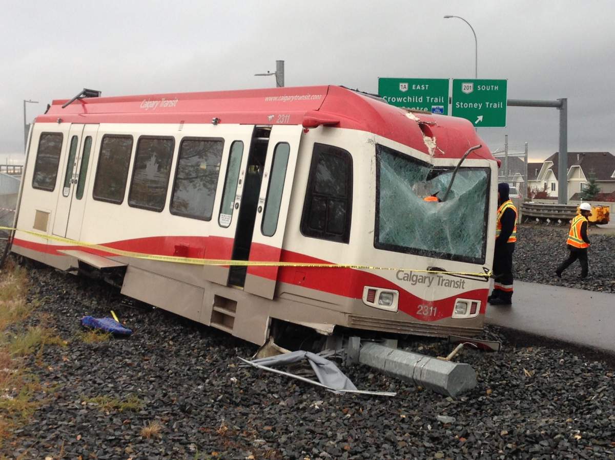 Emergency crews respond to the Tuscany LRT station on Tuesday, Sept. 20, 2016 for a LRT derailment.