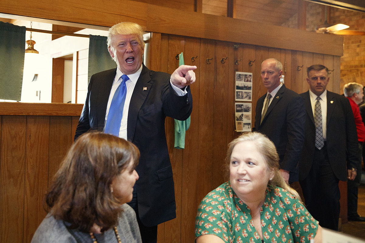Republican presidential candidate Donald Trump makes a visit to Stamey's Barbecue, Tuesday, Sept. 20, 2016, in Greensboro, N.C.
