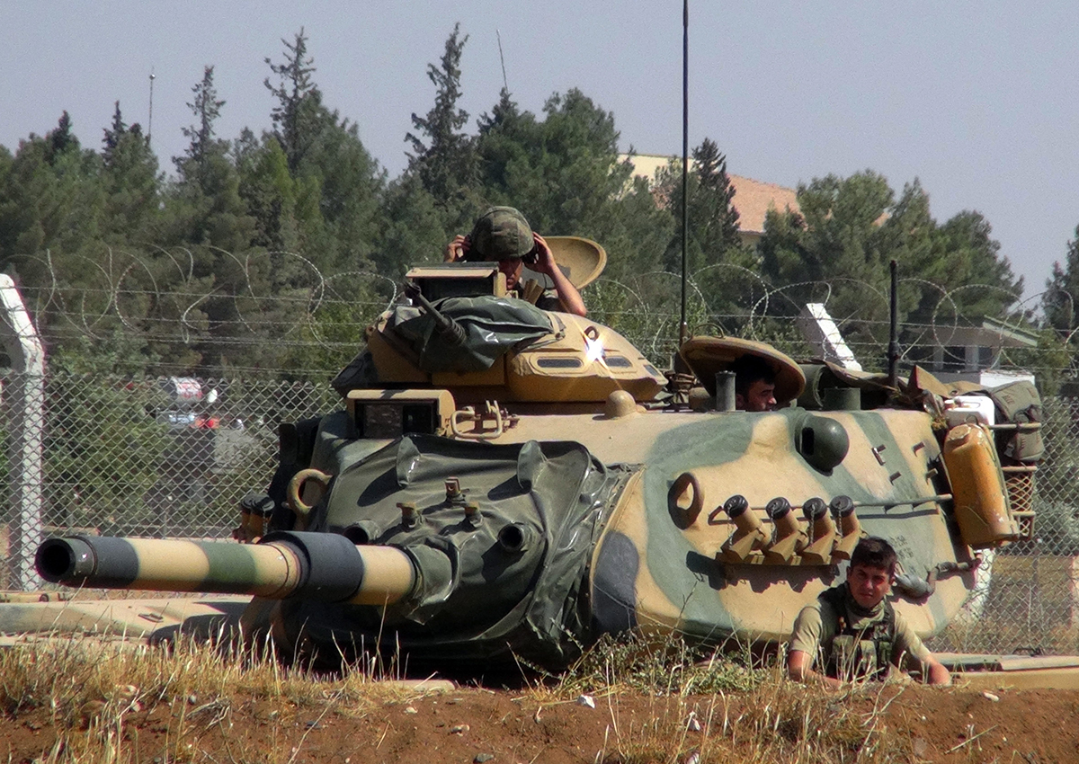 A Turkish army tank stationed near the Syrian border, in Suruc, Turkey, Saturday, Sept. 3, 2016. 