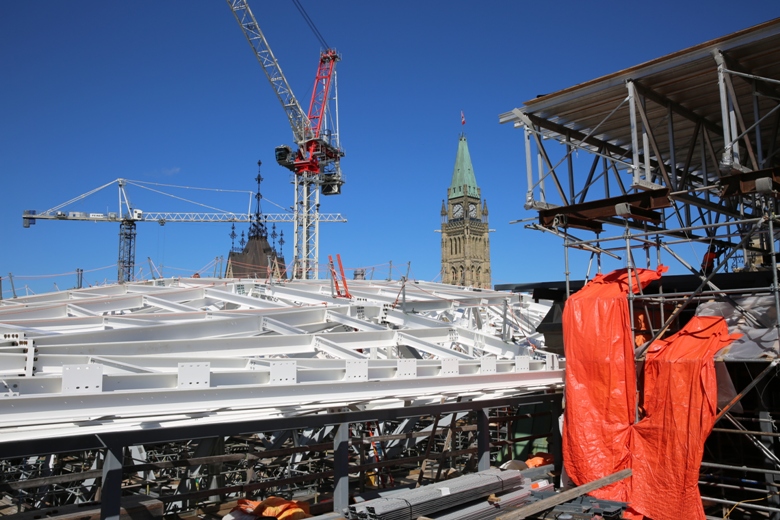 The Peace Tower is seen from the roof of Parliament Hill’s West Block. The entirety of Centre Block’s offices and meeting spaces will move to West Block in two years.