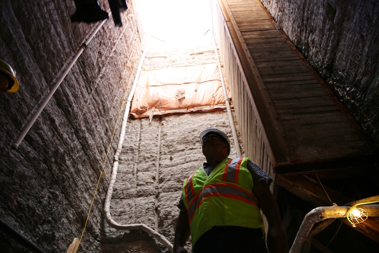 Rocque Gameiro looks up from the depths of the sub-sub-basement. Workers blasted down into the bedrock under the heritage building to create new spaces for committee rooms, offices and delivery areas.