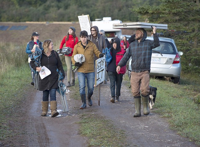 Cheryl Maloney, a Mi'kmaq activist, leads protesters to a blockade of a worksite near the Shubenacadie River in Fort Ellis, N.S. on Monday, Sept. 26, 2016.