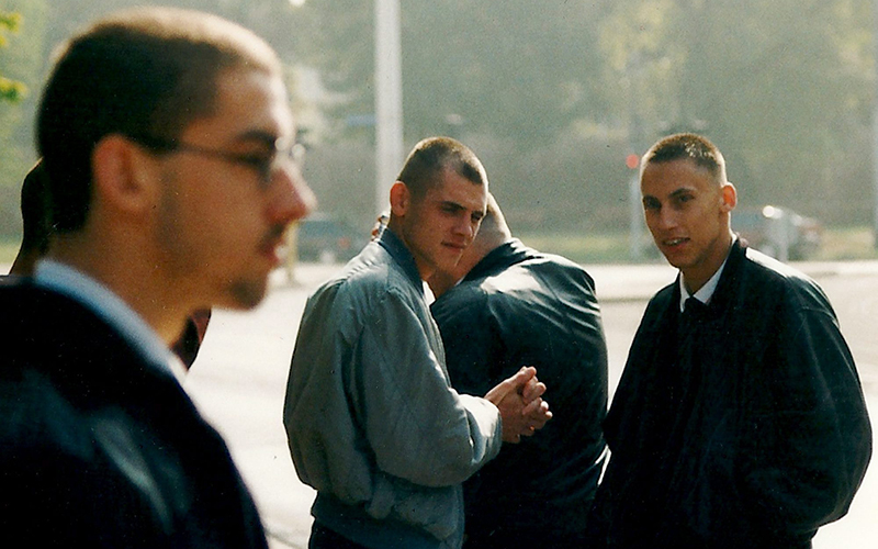 The 1996 photo shows  late terror suspect Uwe Boehnhardt, center, who died in an apparent murder-suicide as police closed in on him earlier this month following a bank robbery, and Ralf Wohlleben, right, during a demonstration in Erfurt, eastern Germany. 