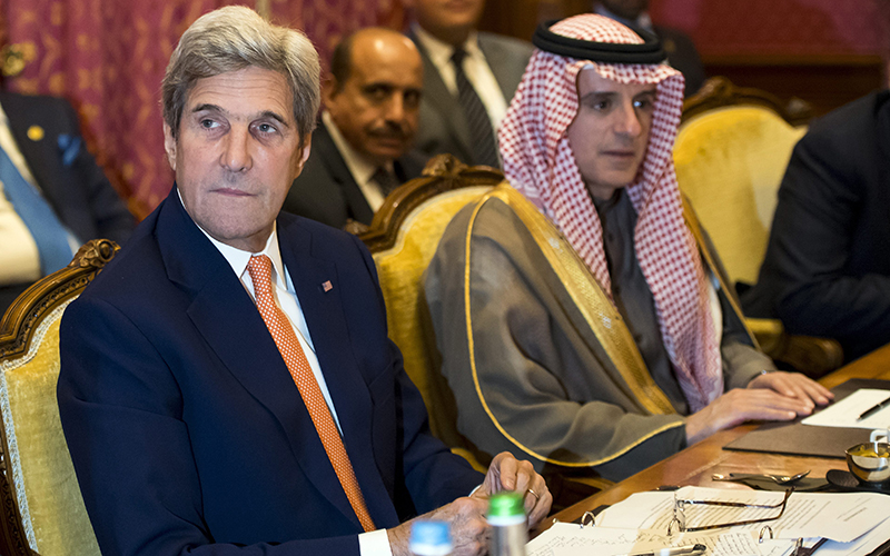 U.S. Secretary of State John Kerry, left, and Saudi Arabia Foreign Minister Adel al-Jubeir, right, attend a bilateral meeting on the crisis in Syria, in Lausanne, Switzerland, Saturday, Oct. 15, 2016. 
