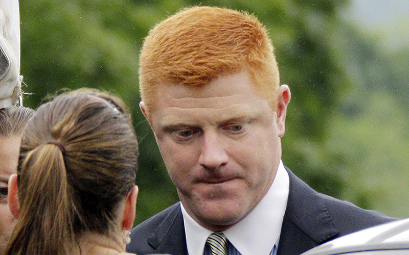 Former Penn State University assistant football coach Mike McQueary arrives at the Centre County Courthouse in Bellefonte, Pa. 