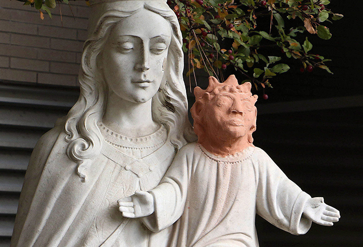 The missing head of a statue of baby Jesus outside Ste. Anne des Pins parish in Sudbury, Ont., has been returned, and the bright orange clay head that replaced it has been removed.