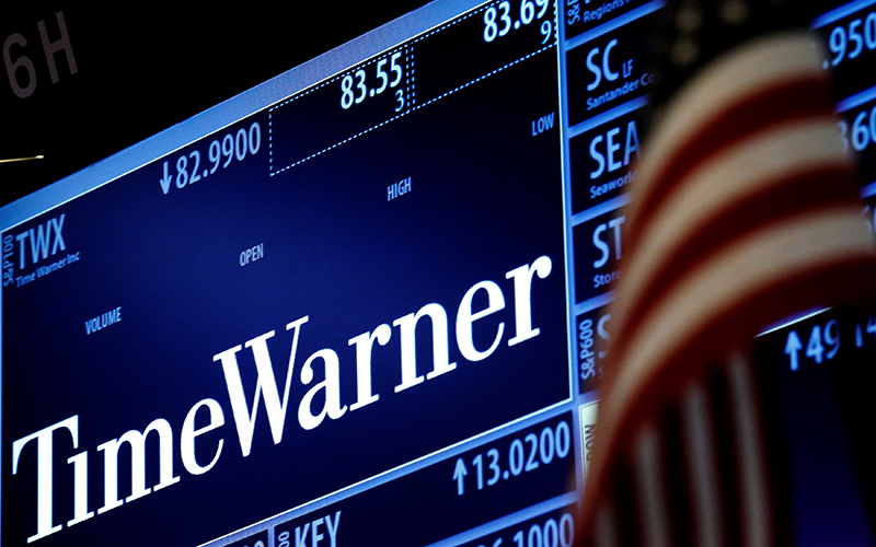 Ticker and trading information for media conglomerate Time Warner Inc. is displayed at the post where it is traded on the floor of the New York Stock Exchange (NYSE) in New York City, U.S., October 21, 2016.  