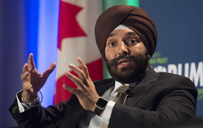 Innovation, Science and Economic Development Minister Navdeep Singh Bains responds to a question from the floor during a policy conference in Ottawa, Wednesday October 12, 2016. Bains said a new program that will fast track job permits for some foreign workers will help create more jobs for Canadians.