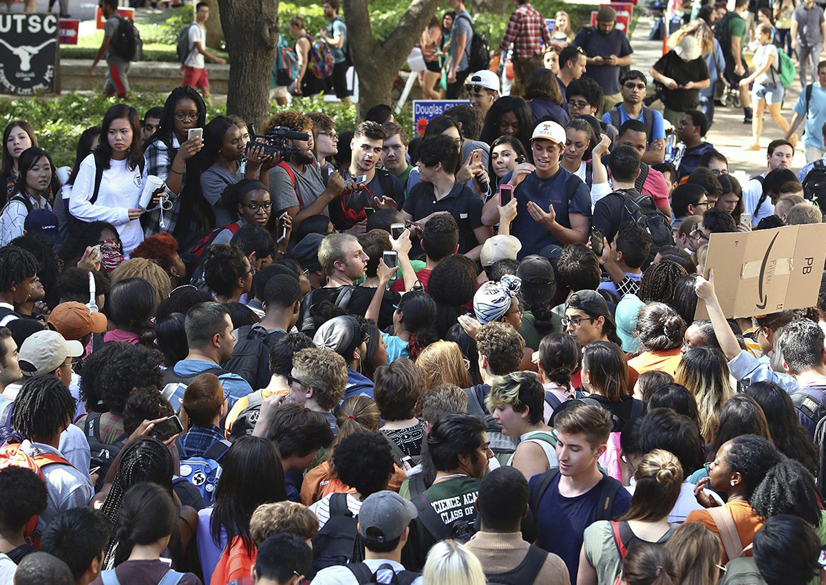 Students gather on the west mall to confront the Young Conservatives of Texas student organization over a controversial bake sale Wednesday, Oct. 26, 2016, on The University of Texas campus in Austin. The Young Conservatives of Texas chapter at the University of Texas-Austin sparked the protest with an affirmative action bake sale. The club encouraged students to ‚ "buy a cookie from us and talk about the disastrous policy that is affirmative action.".