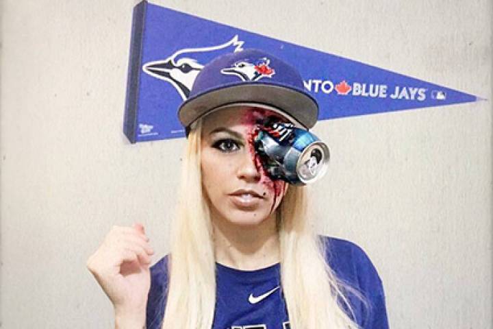 For Halloween this year, makeup artist Stephanie Marziano-Hillhouse took the beer throwing incident from the AL wild-card game and used makeup to show a can sticking out of her eye.