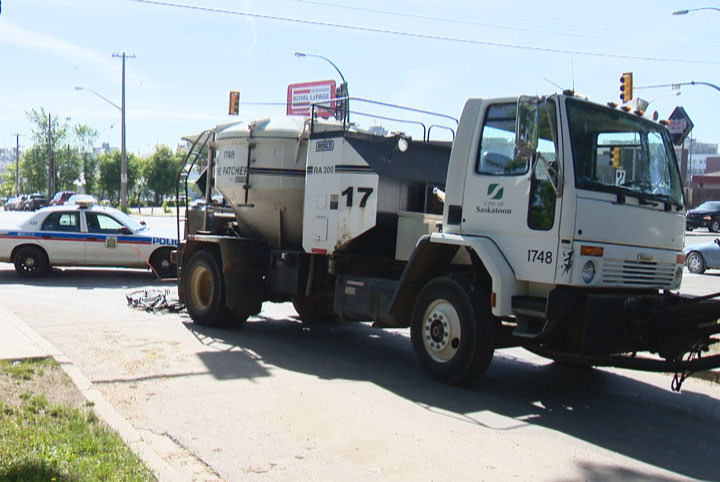 Saskatoon police's investigation concluded after a street-patching truck collided with a man on a bike in June.