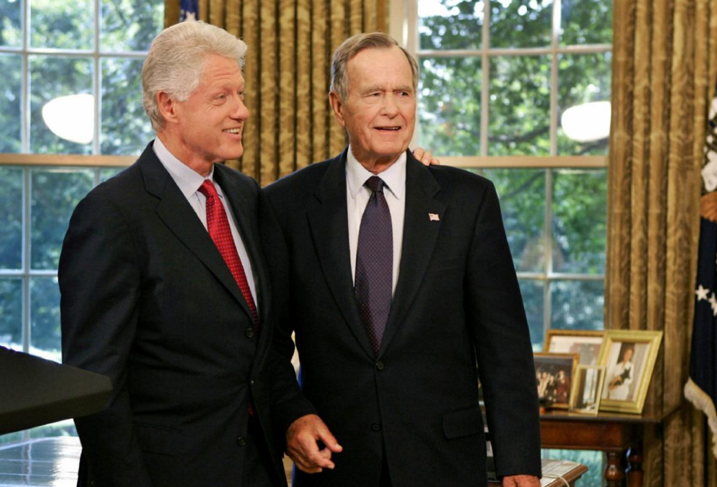 Former U.S. presidents Bill Clinton and George H.W. Bush in the Oval Office, 2005.  