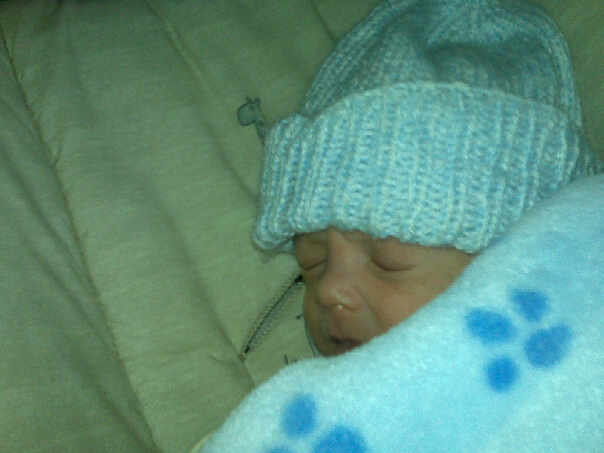 Newborn photo album of Eileen and son Jacob in 2008.