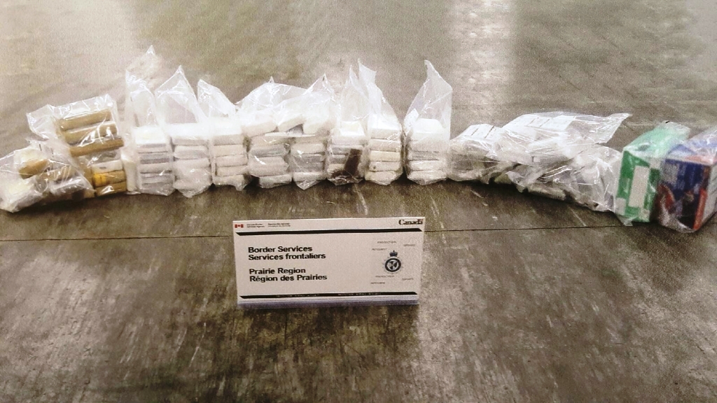 The Canada Border Services Agency, along with RCMP, show cocaine seized during a drug importation investigation at the Coutts border crossing that focused on commercial vehicles. 