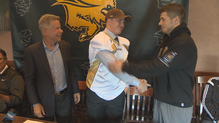 New Manitoba Bisons recruit Brody Williams is congratulated by DJ Lalama after committing to the Bisons starting in the 2017 season.