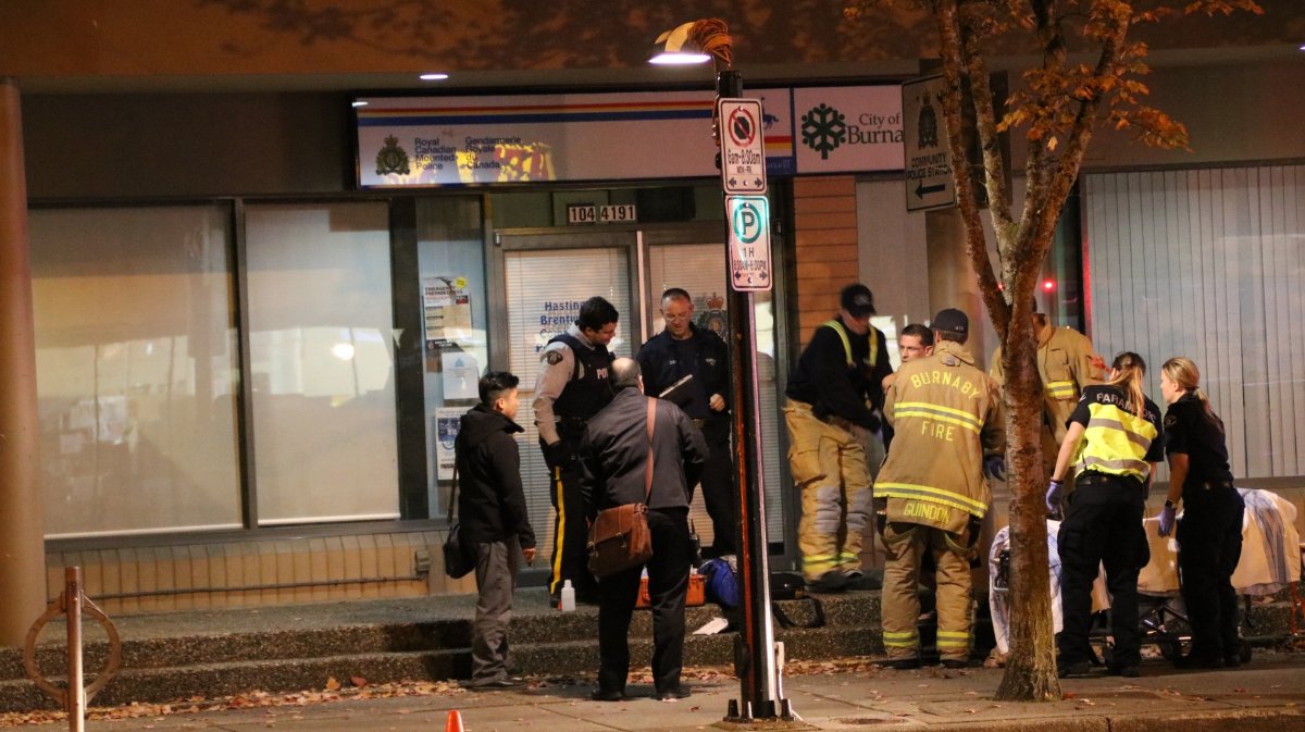 A man was found on the steps of the RCMP detachment in Burnaby after being stabbed nearby.