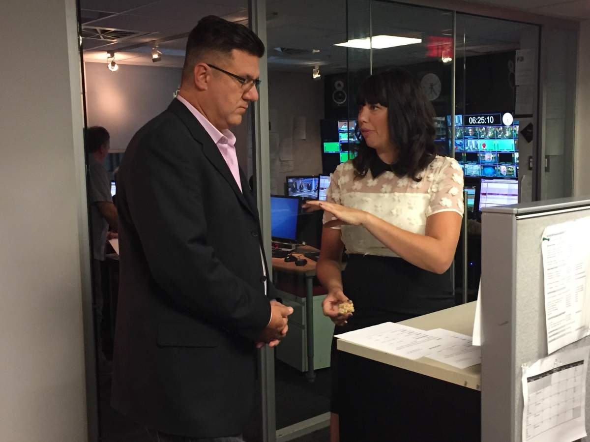 Global News Morning in Montreal guest host Cat Spencer prepares to go on air with weather specialist Kim Sullivan, Friday, October 21, 2016.
