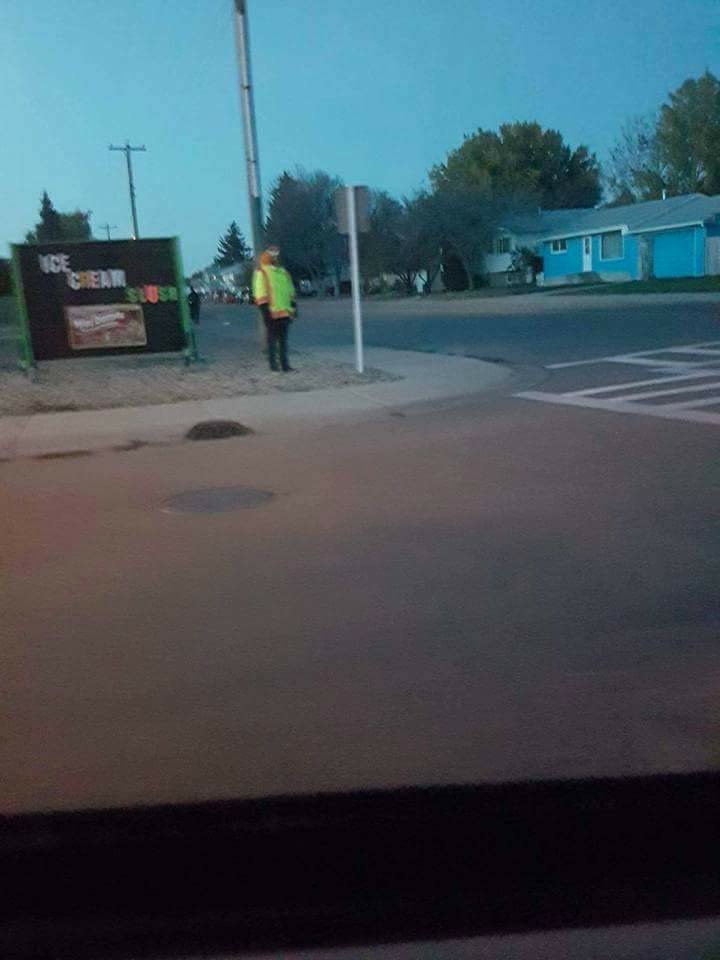 Jordan White standing in ‘creepy clown’ costume in Taber Alberta.