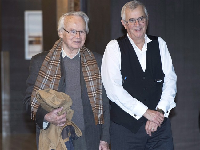 Former Liberal organizer Jacques Corriveau, left, and his lawyer, Gerald Souliere, arrive at the courthouse, Tuesday, October 25, 2016 in Montreal. 