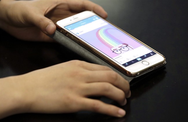 Japanese Vine artist Hayatto Noguchiu shows off his work on a smartphone in Tokyo in this June 30, 2016 file photo. 