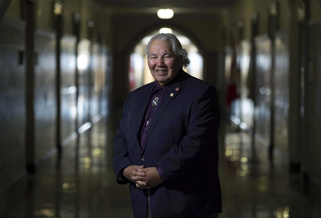 Sen. Murray Sinclair poses for a photo outside his Senate office on Parliament Hill, in Ottawa in a September 20, 2016, file photo.