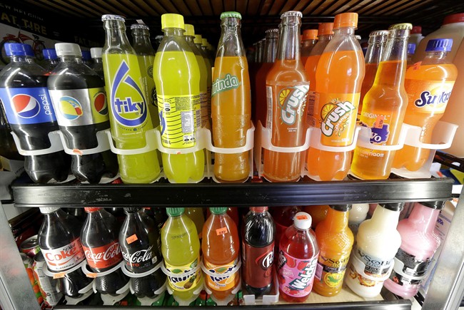 Soft drink and soda bottles are displayed.